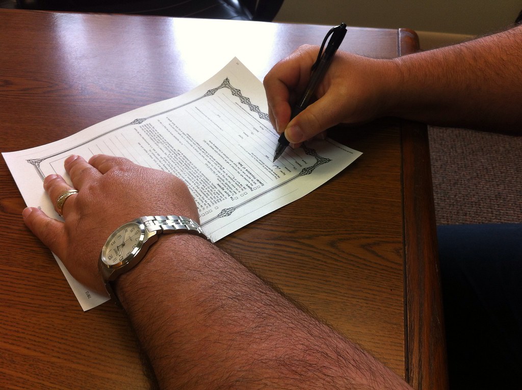 Signing paperwork contract