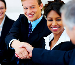Two business people shaking hands