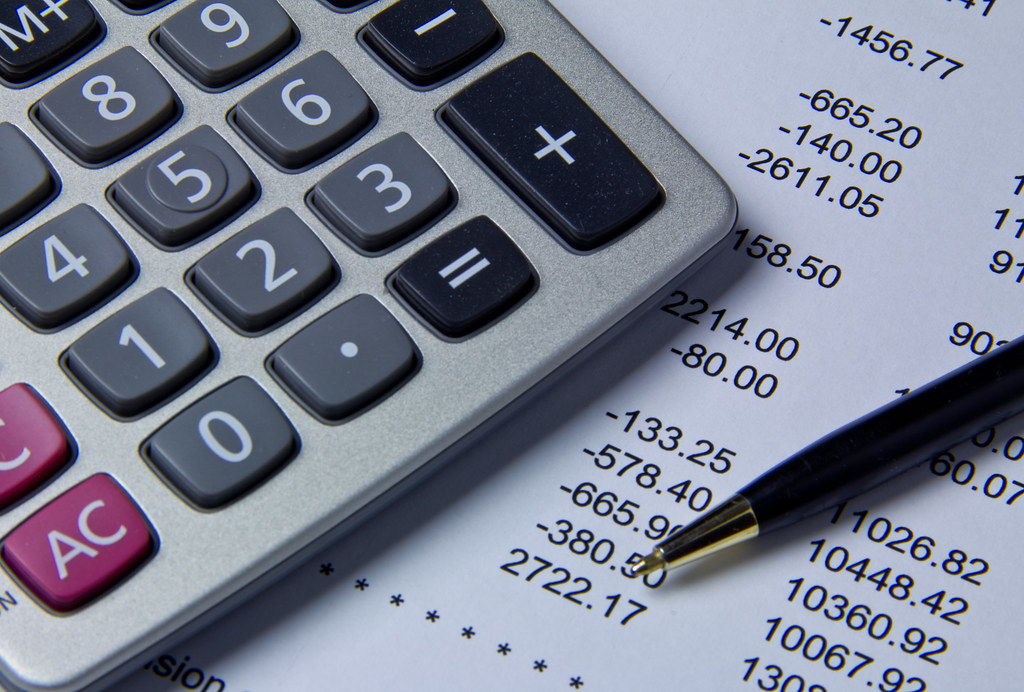 Retirement documents and a calculator
