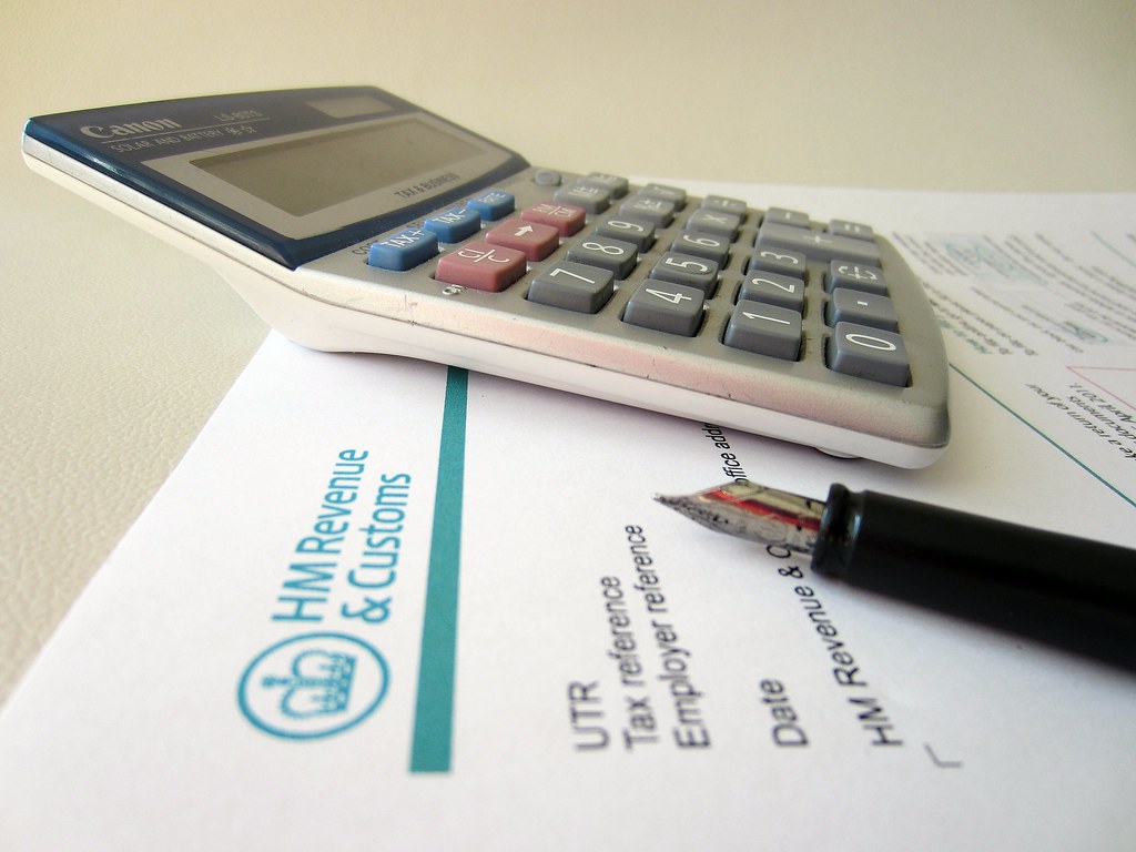 Stack of tax forms on a desk