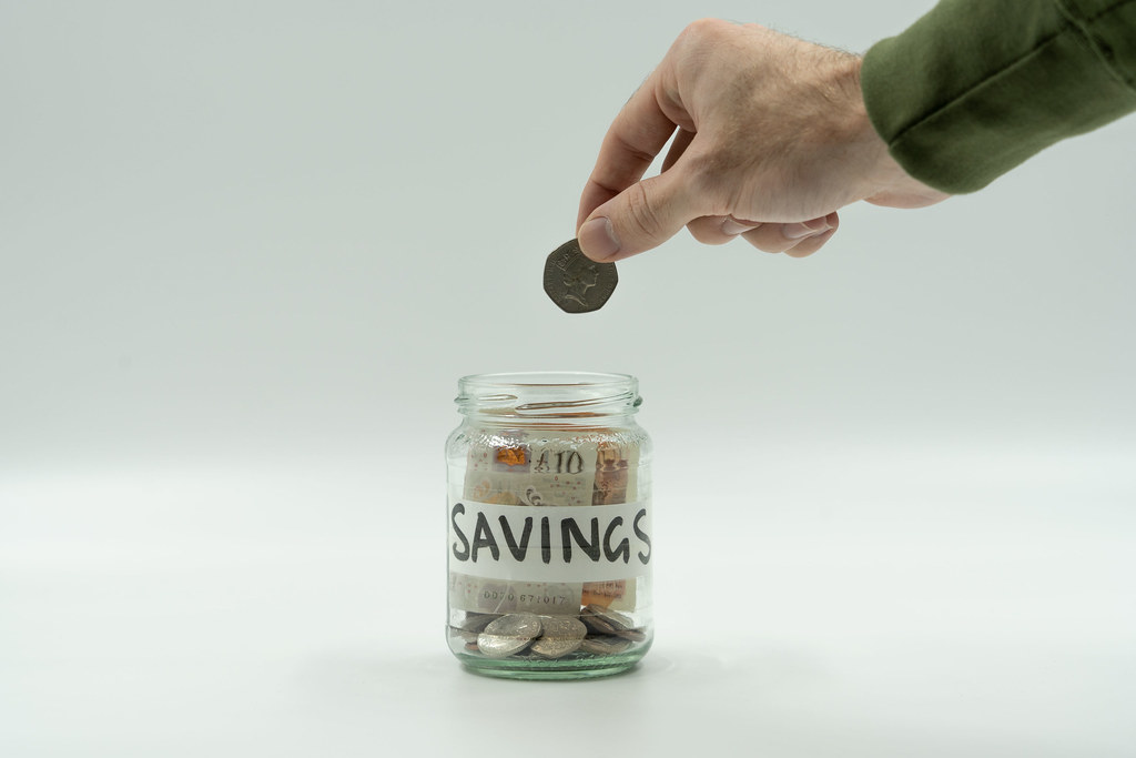 Jar of coins representing retirement savings